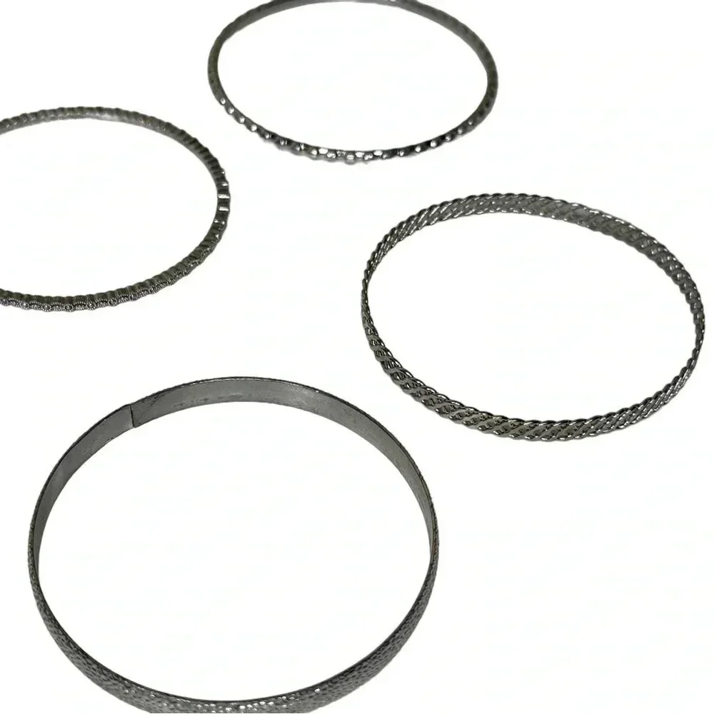 Set of 4 silver bangle bracelets